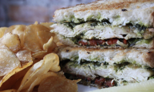 A sandwich served with chips