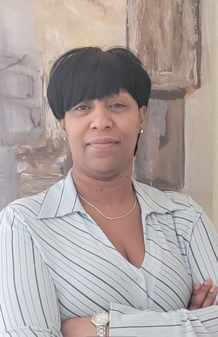 Felicia Roach smiles