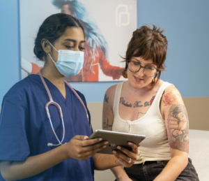Doctor helps patient