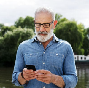 a man looks at his phone